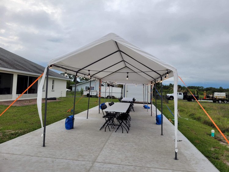 10x20 Tent Package (18 Black Chairs & 3 Rectangle Tables)