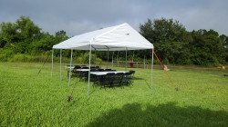 IMG 20220918 092526041 1702601555 10 FT x 20 FT Frame Tent Package (18 Black Chairs & 3 Rectan