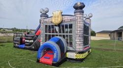 430377862 427511789861846 6706758119412105761 n 1738207773.jpg Police Bounce House Package (18 Black Chairs & 3 Tables)