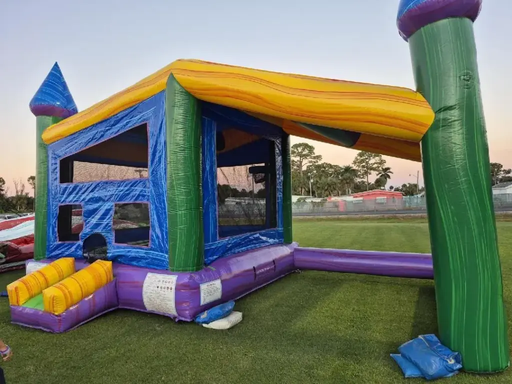 Kids bounce house rental in North Fort Myers, FL with slide and large jumping area