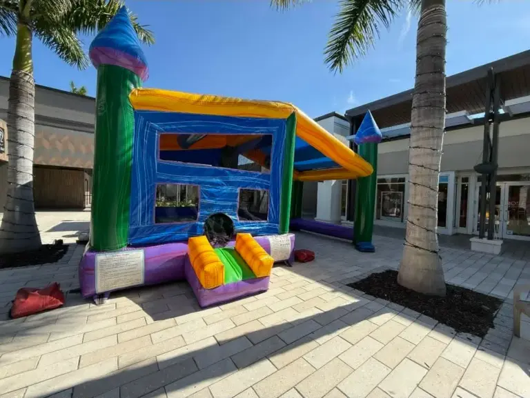 Bounce house rentals in Gateway FL — colorful castle bounce house set up at an outdoor community event