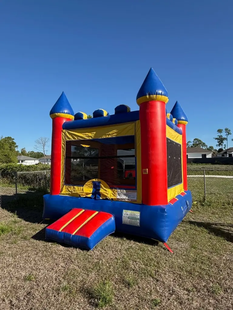 Classic red blue yellow bounce house rentals in Buckingham FL for backyard parties