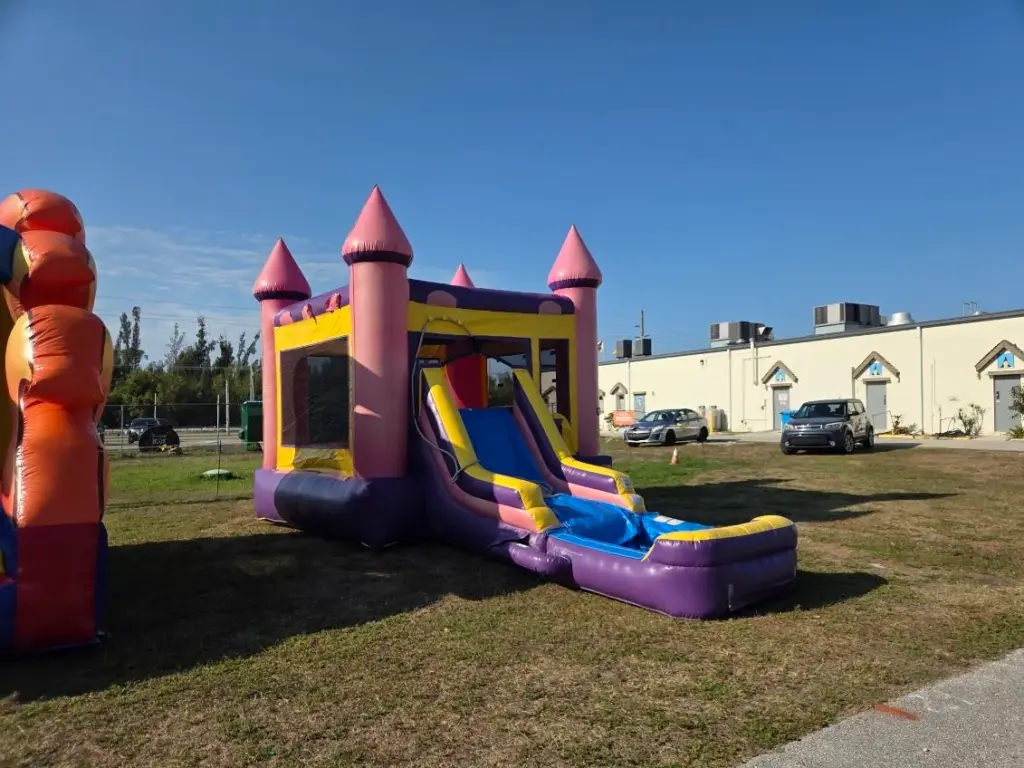 Pink castle bounce house with slide rentals in Buckingham FL for kids birthday parties