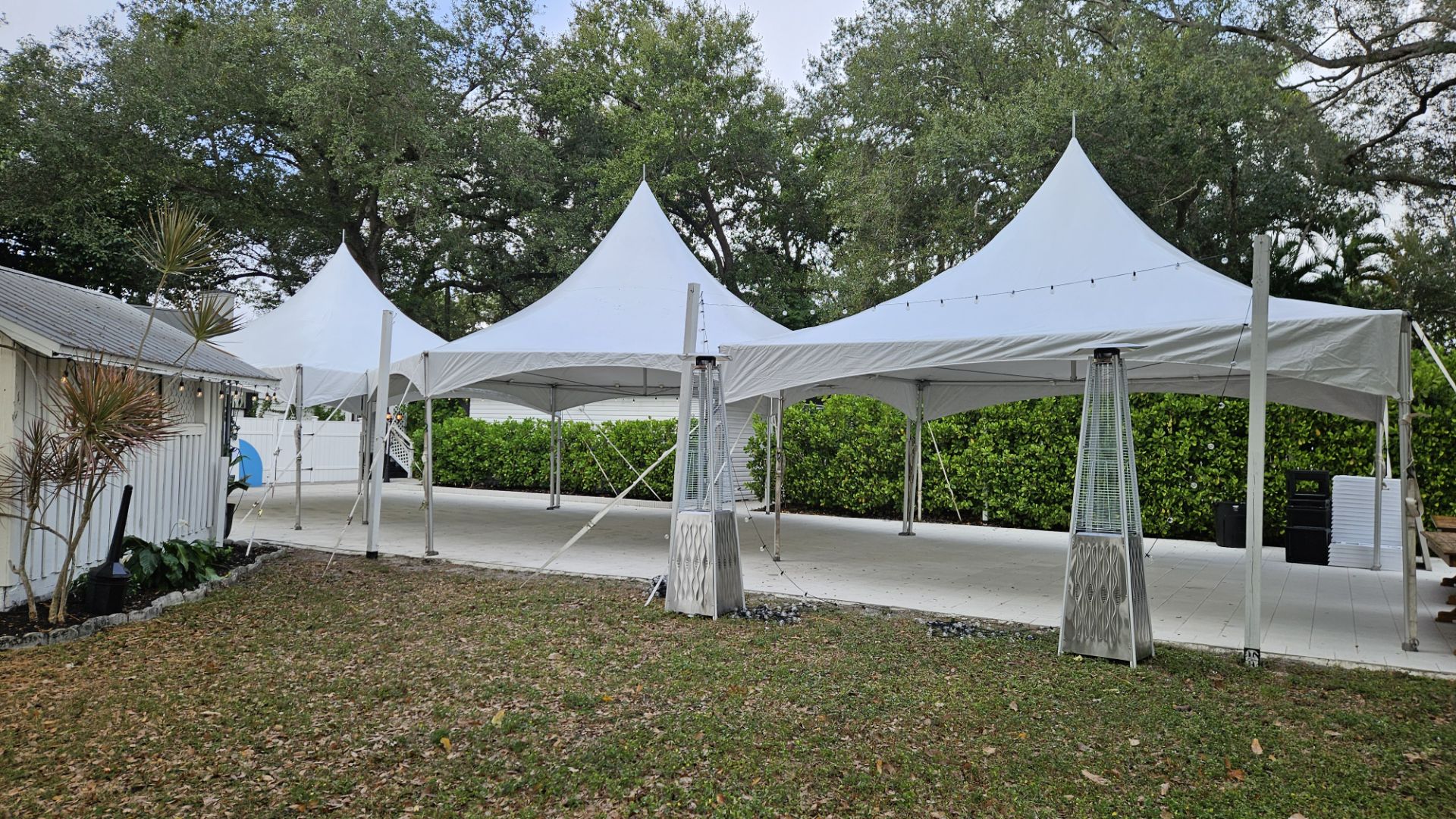 Large Family First event setup with a 30x30 hex tent and 20x20 high peak tents in Southwest Florida
