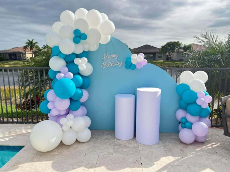 Custom birthday balloon backdrop rental with organic balloon garland in Fort Myers Florida