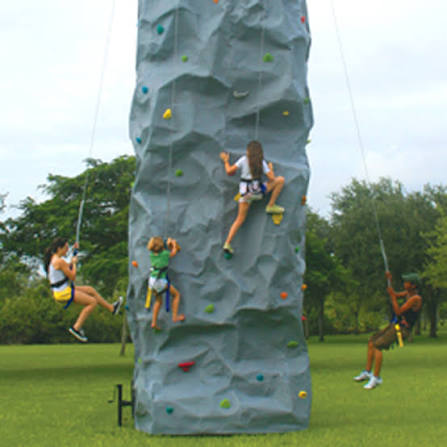 Family First Events & Rentals 24 FT rock wall rental with multiple climbers for Fort Myers FL events