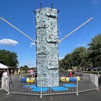 Family First Events & Rentals staffed rock wall attraction for Fort Myers FL school and family events